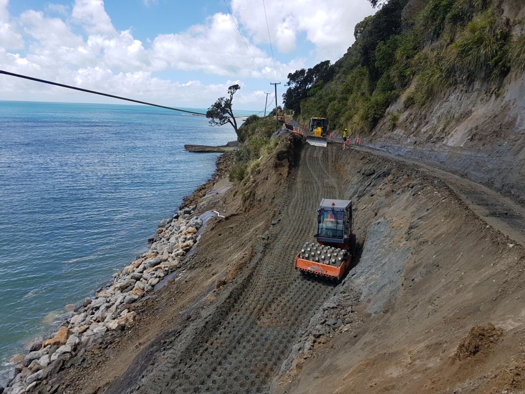 a construction vehicle on a dirt road