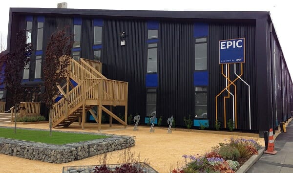 a building in Christchurch with a sign and stairs