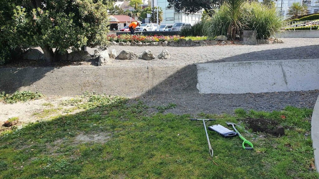 geotechnical investigation testing equipment laying on grass
