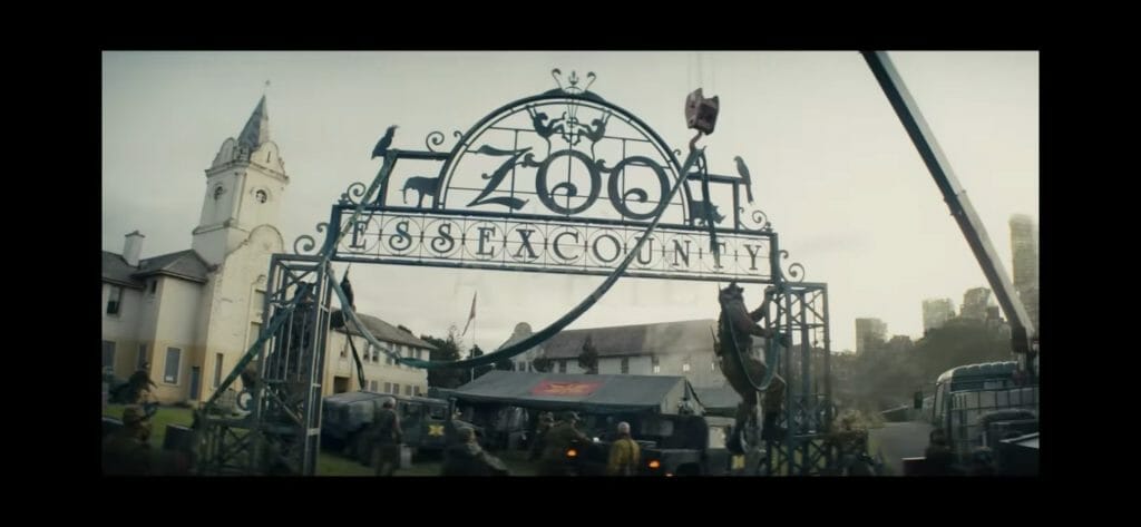 a wrought iron sign reading zoo essex county.